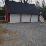 Finished garage with white doors