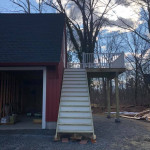 Detached garage with stairs to upper deck